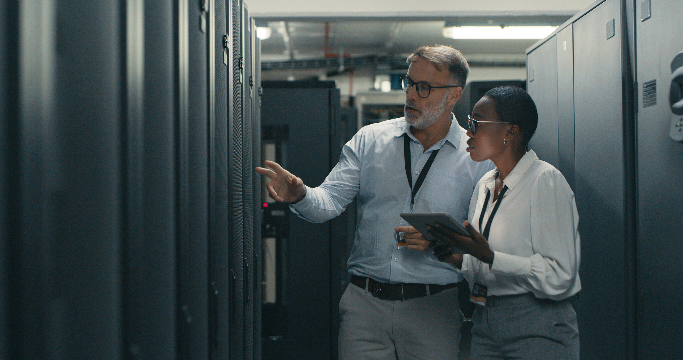 IT professionals working in a data center.