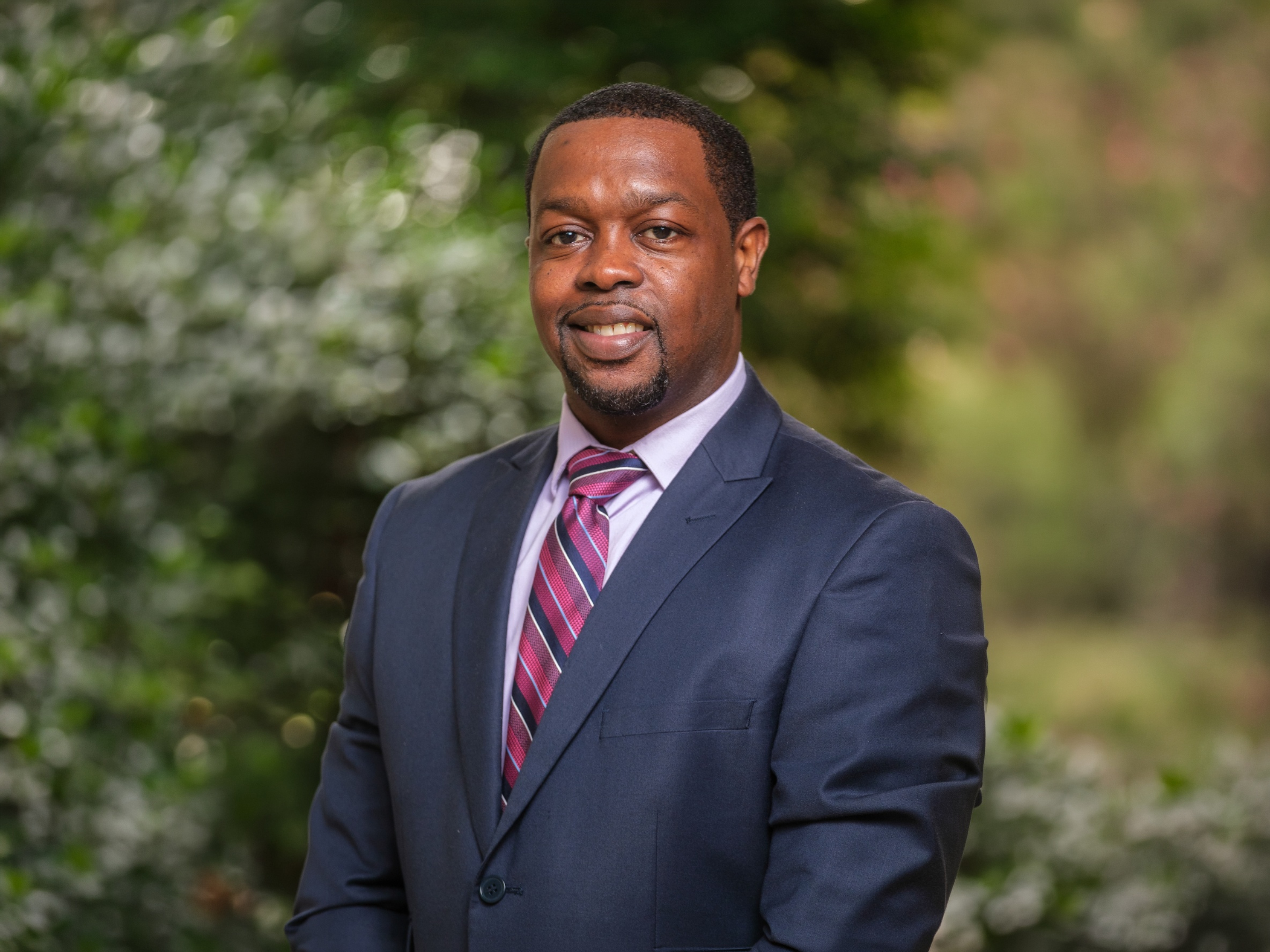 Headshot of Dr. Steven Day in a suit.
