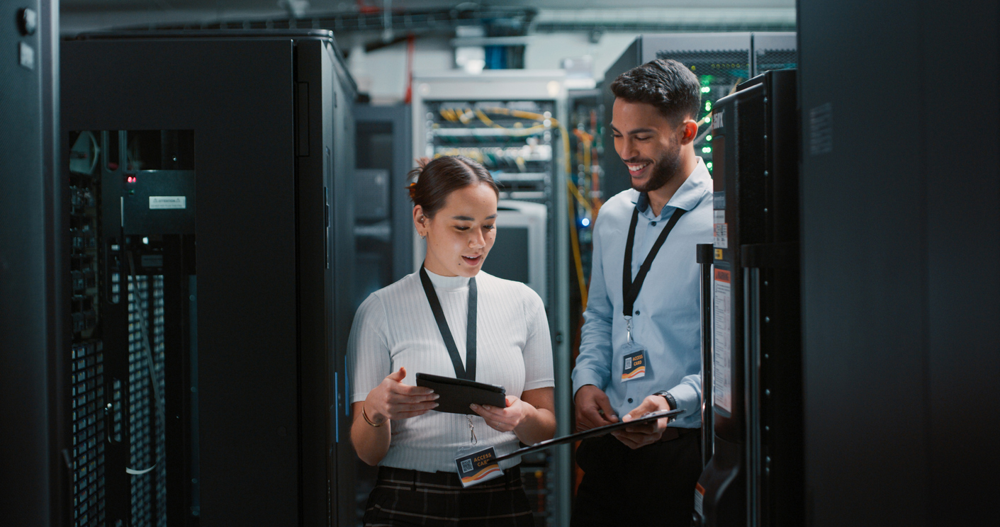 Two It Professionals Working in a Server Room